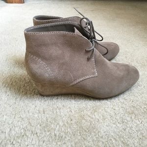 Tan Nine West booties.